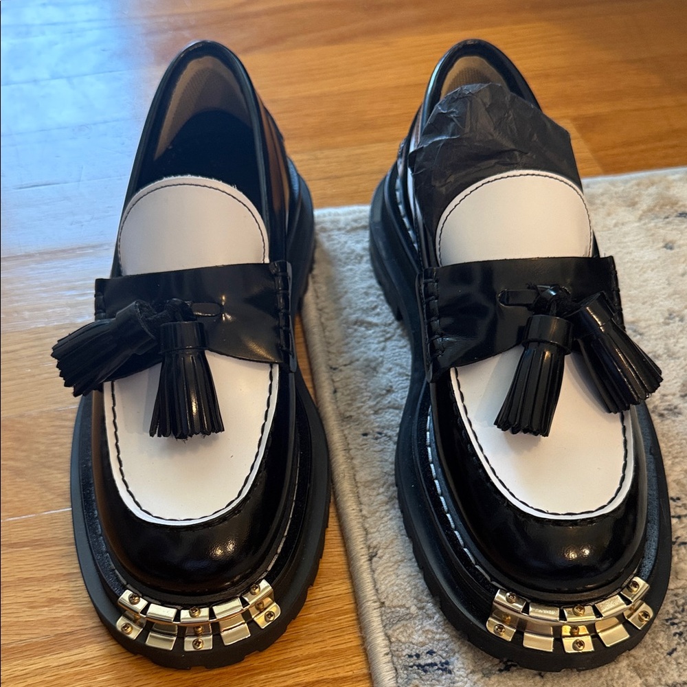 Sandro Black and White Tassel Loafers